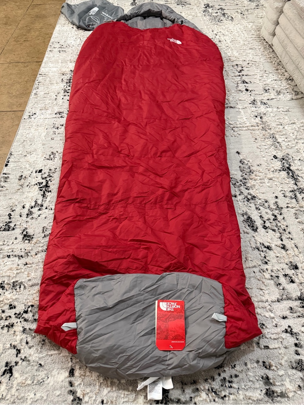 The North Face Red and Gray Mummy Sleeping Bag